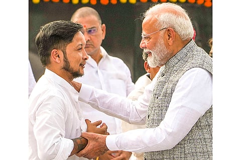 Prime Minister Narendra Modi meets with singer Pawandeep Rajan